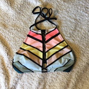 A rainbow striped bathing suit top from Pink